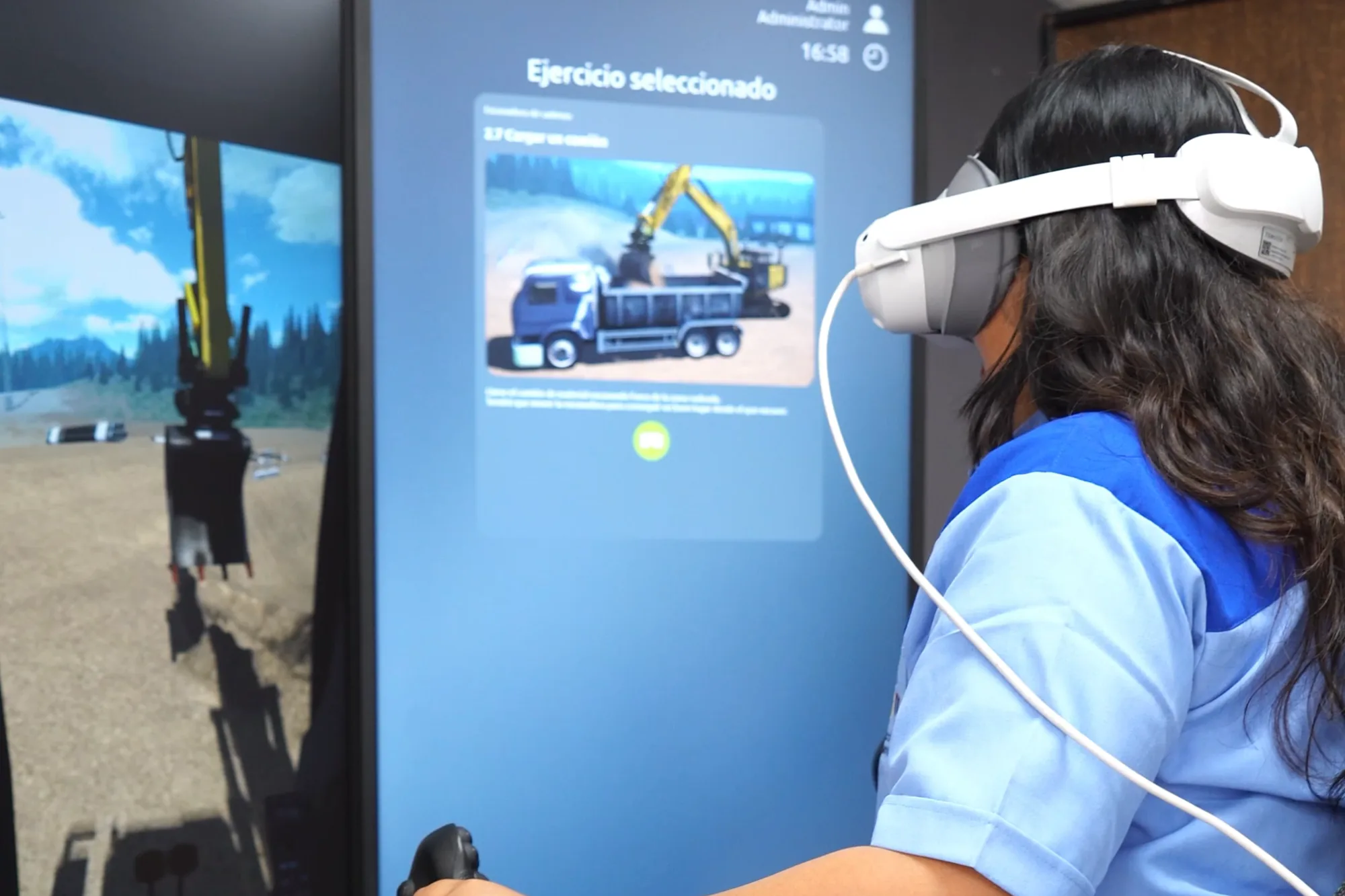 Trainee wearing a VR headset practicing on the academy's excavator simulator